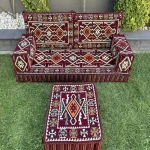 Comfortable Majlis Sofa with floor cushions and a low table.