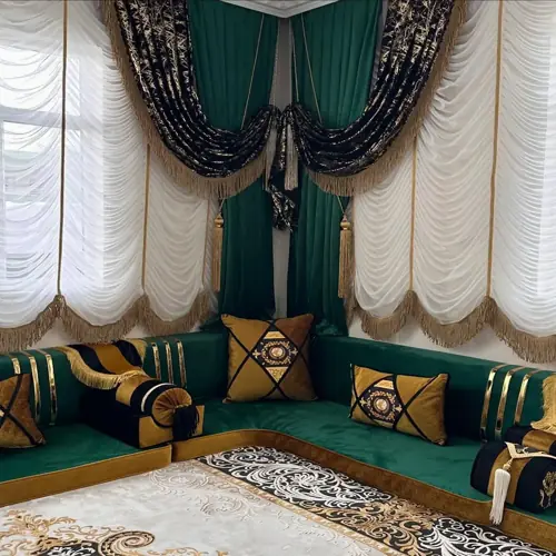Majlis seating arrangement in rich emerald tones