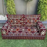 Handwoven Majlis Sofa with colorful geometric patterns.