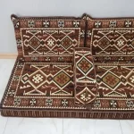 Simple Majlis sofa featuring colorful tribal motifs