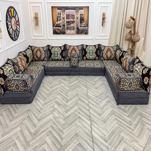 Stylish Majlis arrangement with black and vibrant motifs