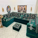 U-shaped Majlis sofa with ornate geometric detailing.