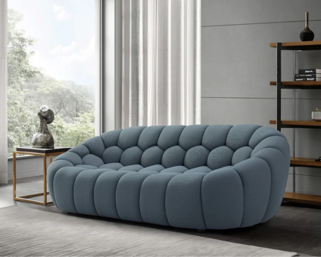 Blue bouclé sofa with deep bubble-style seating