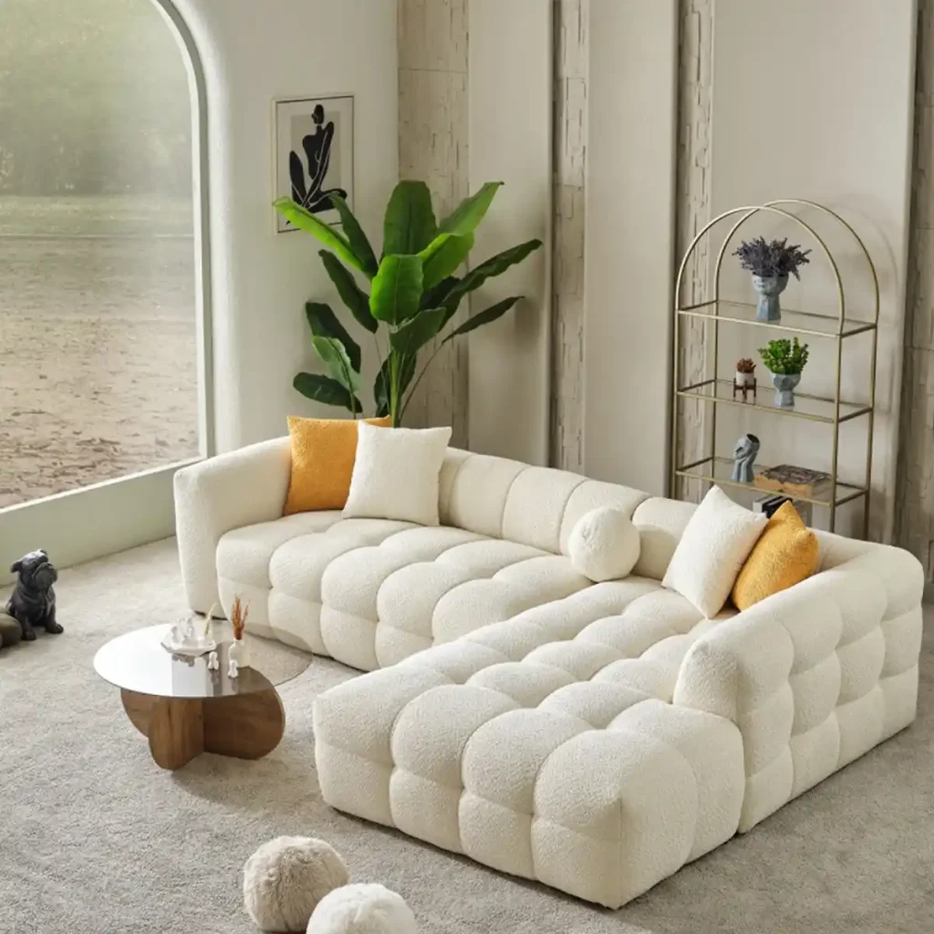 Cream modular sectional sofa with plush curved design