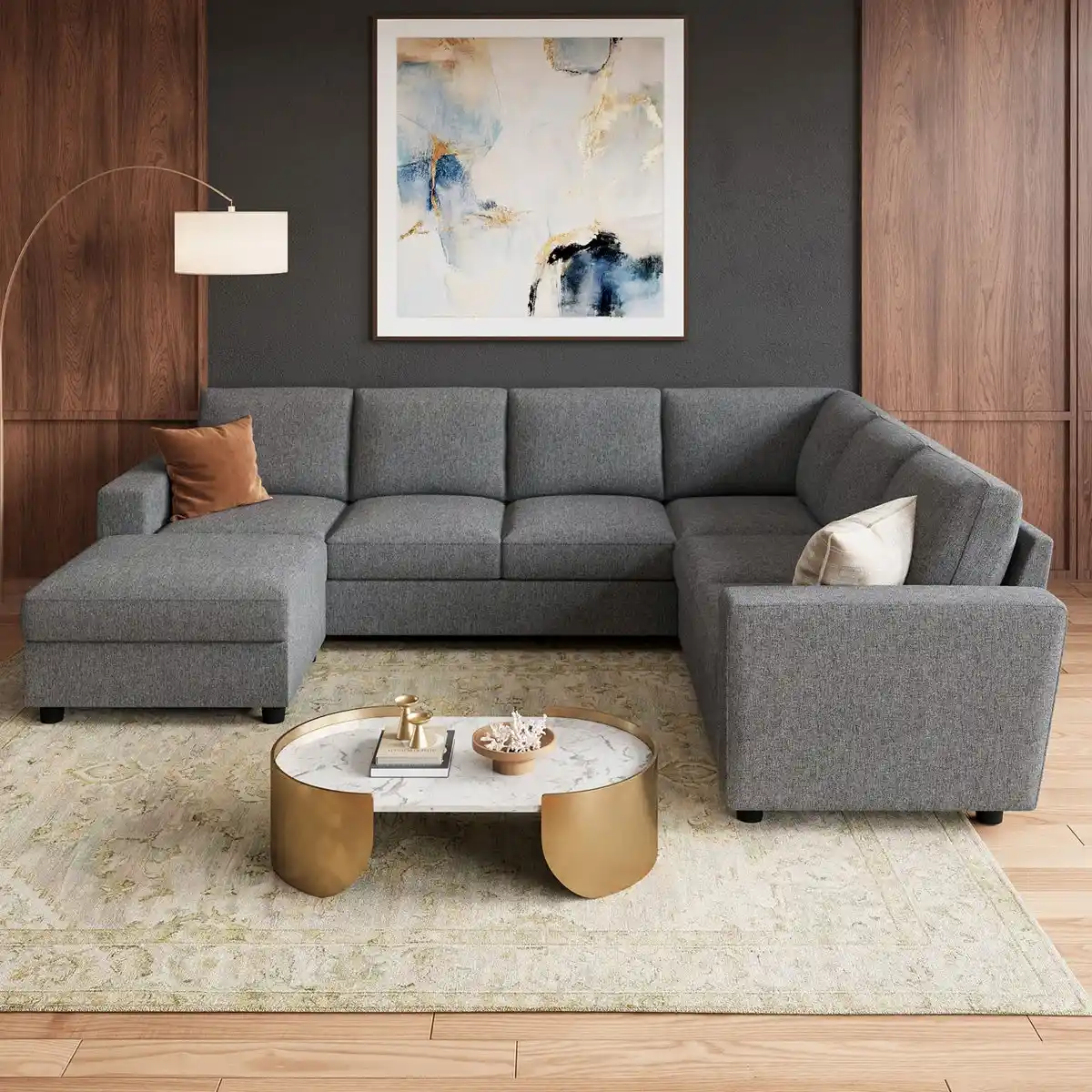 Minimalist U-shaped sofa styled with marble coffee table
